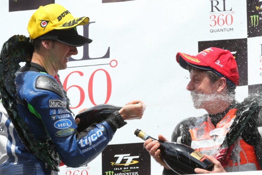 Hutchy and Kneen on podium. Pid: iomtt.com